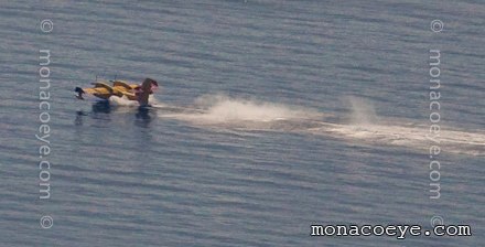 Canadair scooping up water