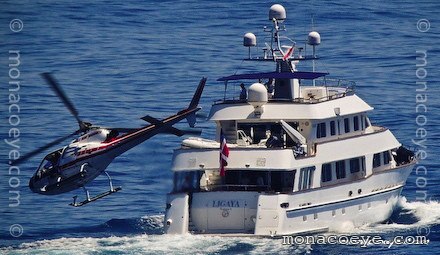 Helicopter takes photos of Ligaya yacht