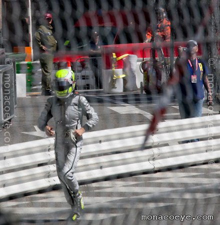 Jenson Button jogs back to winner's podium