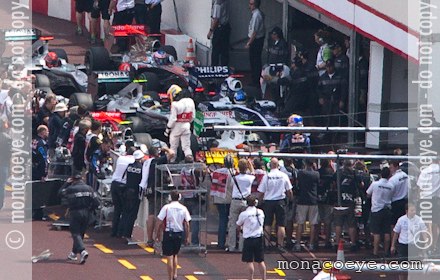 lewis hamilton long hair 2006. Above, Lewis Hamilton stands